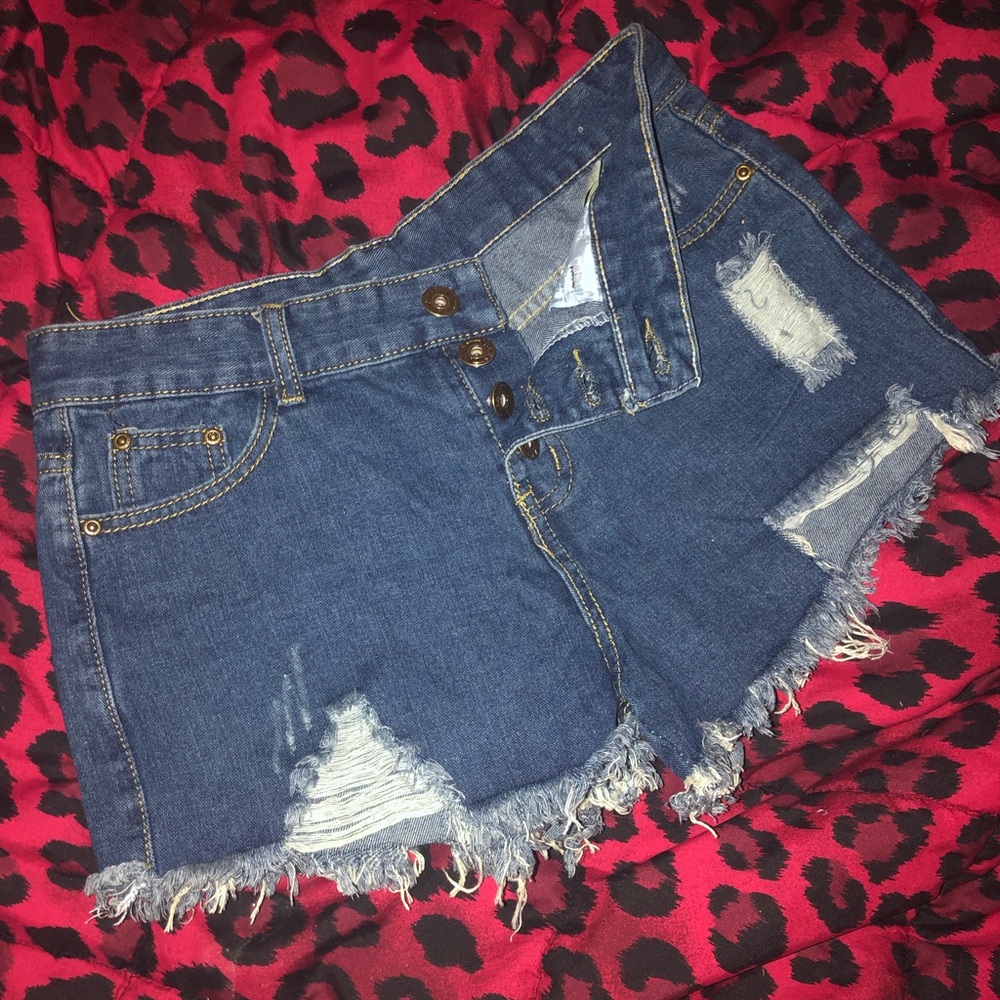 Distressed denim shorts